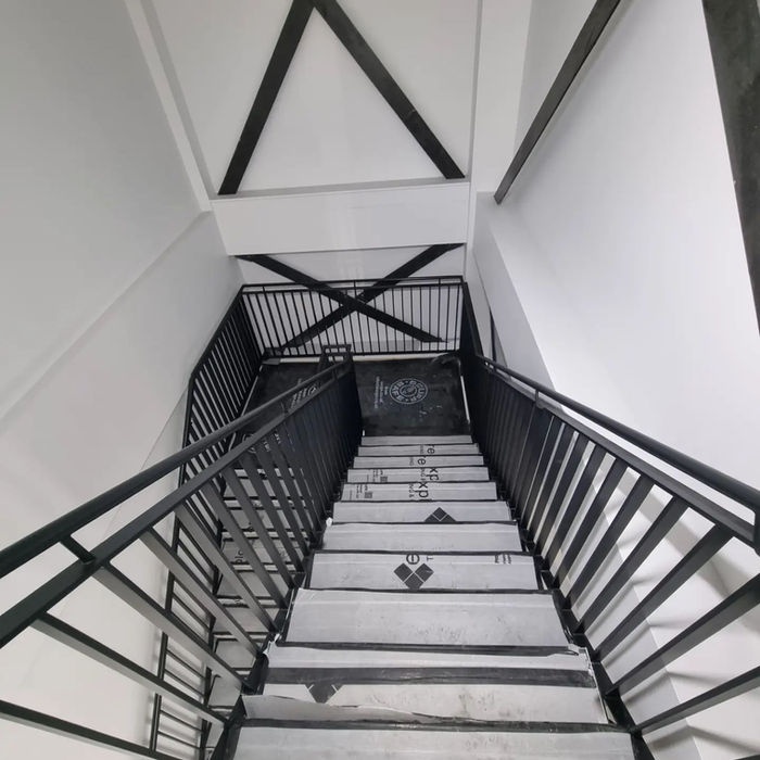 Restored and painted rails, handrails, brackets, and a roof frame window with a durable, high-quality finish