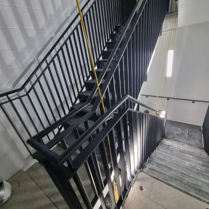 Restored and painted rails, handrails, brackets, and a roof frame window with a durable, high-quality finish.