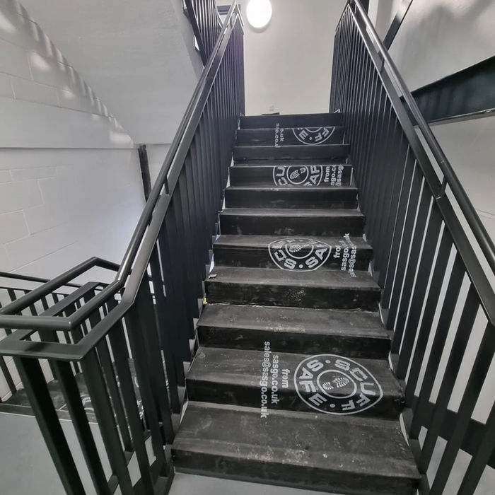 Restored and painted rails, handrails, brackets, and a roof frame window with a durable, high-quality finish.