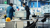 photovoltaics-factory-manager-working-with-solar-engineering-team (1)-min.jpg