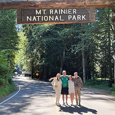 Historic entrance sign welcoming visitors to Mount Rainier National Park since the early days of the park