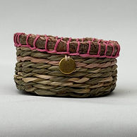 Handwoven natural mini basket plant fibres summer season warmth playful eco-friendly.jpg