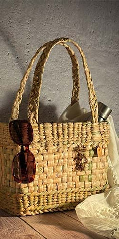 Natural English Rush summer handbag handwoven by Anita Lomas of Much Nita Weaving. The English rush has been sustainably hand harvested from the water.