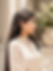Woman wearing elegant Korean-style drop earrings