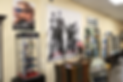 A bright and organized interior view of Custom Optical in Jackson, MS, featuring display shelves filled with stylish eyeglasses and contact lenses. The modern and welcoming space provides a comfortable shopping experience, with expert optical services available to help customers find the perfect eyewear.