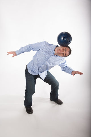 Michael Rosman bowling ball on head corporate