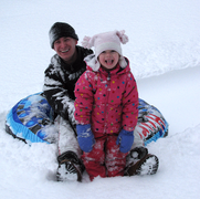 Family winter tubing fun at Singing Hills Camp NH