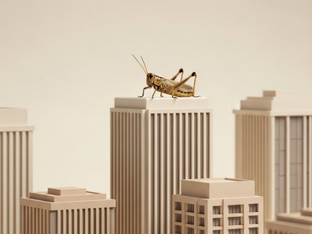 a grasshopper on top of corporate buildings