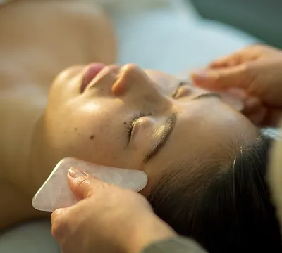 Young woman receiving facial rejuvenatio.webp