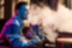 young-men-vaping-from-hookah-indoors.jpg