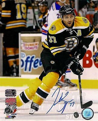 Patrice Bergeron Boston Bruins Signed autographed home action 8x10