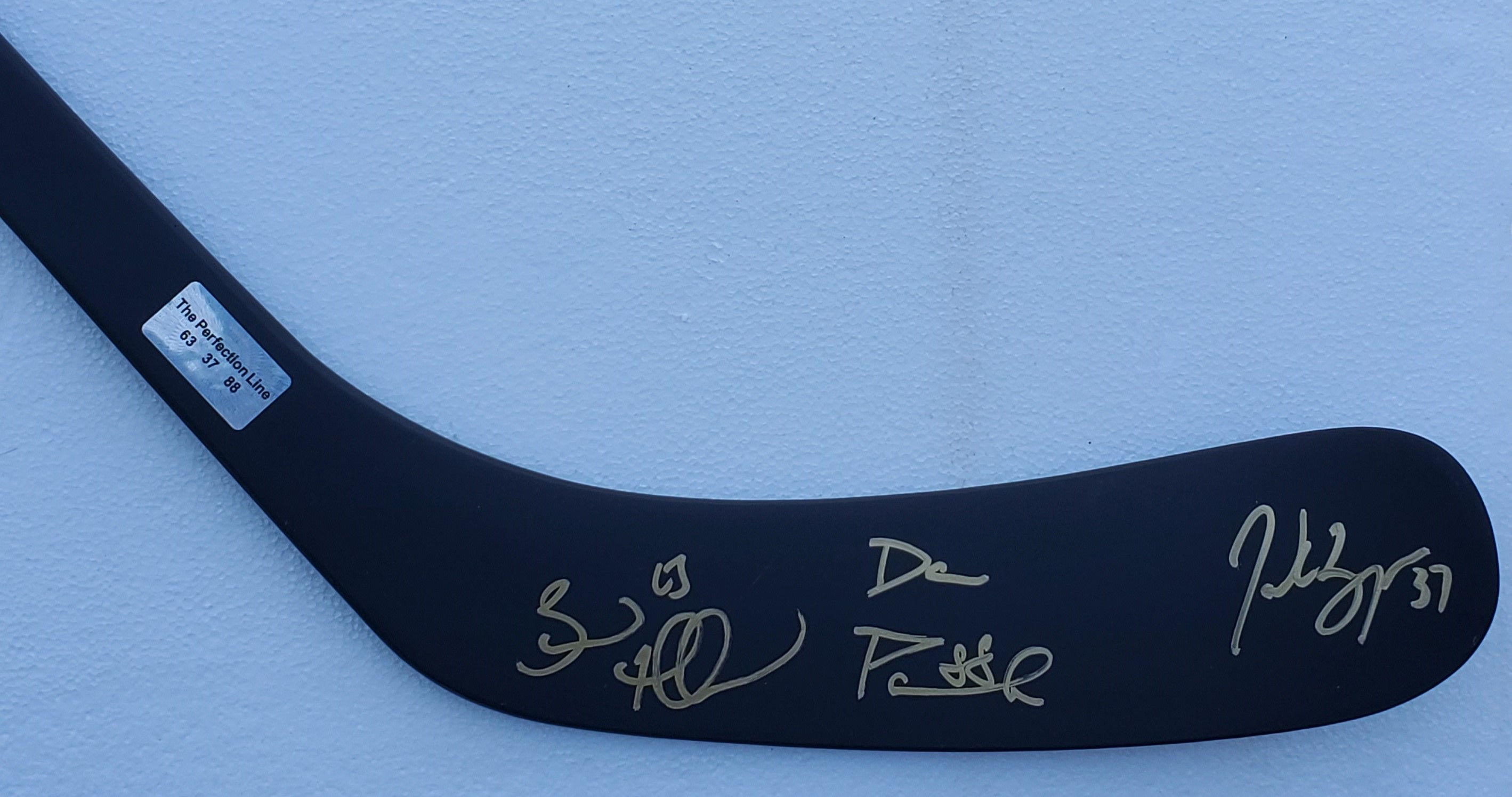 Brad Marchand Patrice Bergeron David Pastrnak Boston Bruins signed Logo stick