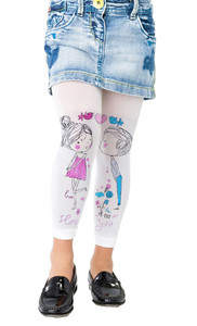 A close-up of white leggings with illustrated figures and small decorative elements, worn with a denim skirt and black shoes.