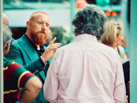 Rua Gleeson interacting with guests at a live event
