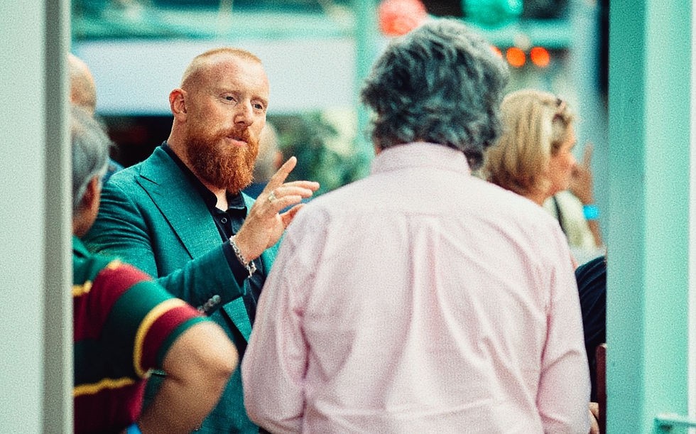 Rua Gleeson interacting with guests at a live event