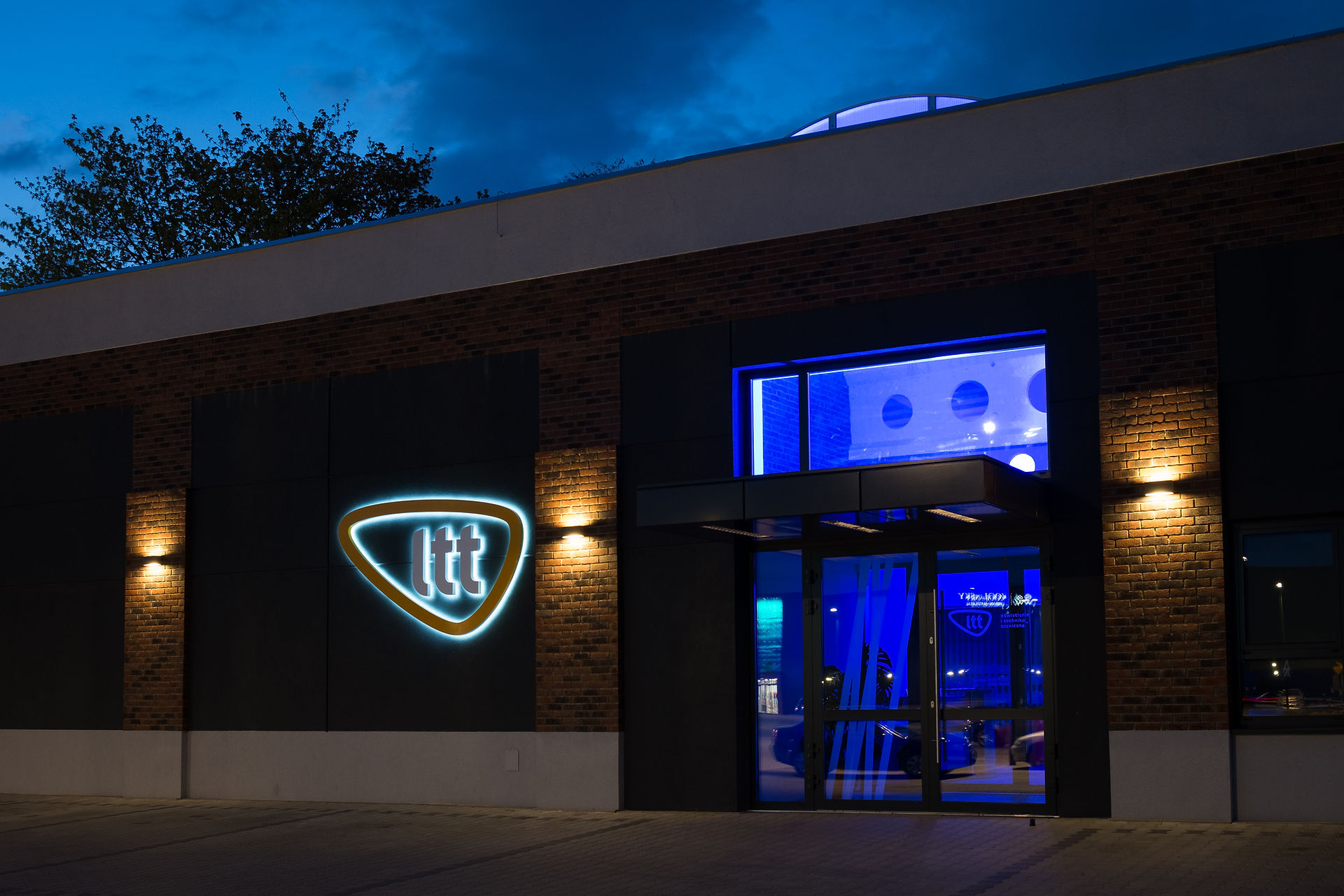 ltt company building, evening scene, ltt logo on building front