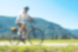 Man writing a bike on a road