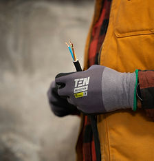 Professional electrician installing wiring in a residential home
