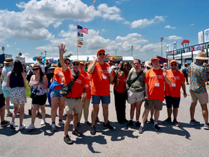 Chartwell Center classes at Jazz Fest -- Folwell Dunbar, waving.