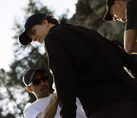 Golf player looking over his shoulder.