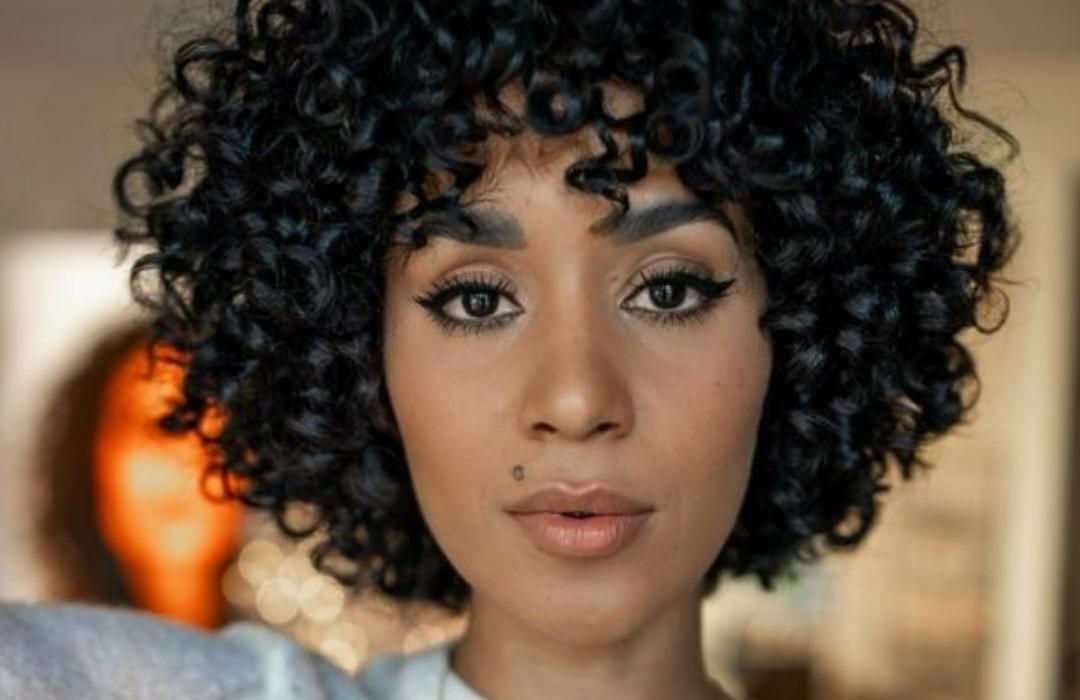 DH Solutions hair salon website template - woman with medium-short curly hair