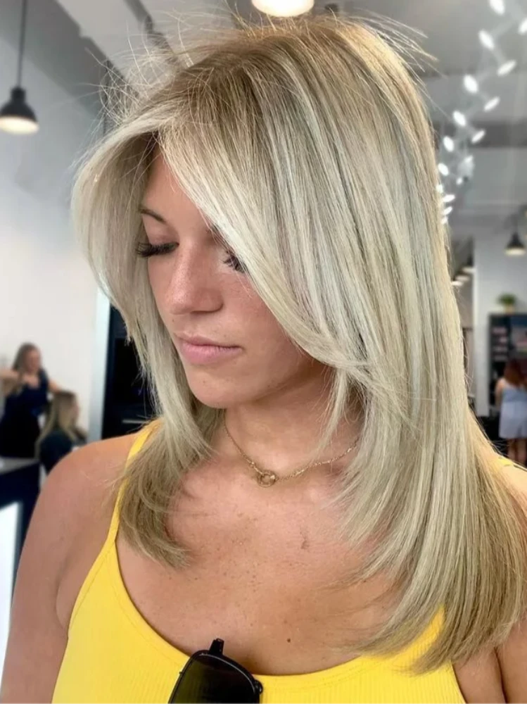 DH Solutions hair stylist website template - woman with platinum blonde hair and slight roots