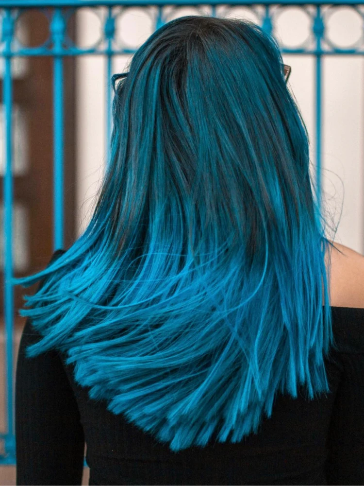 DH Solutions hair stylist website template - woman with single process hair color in blue