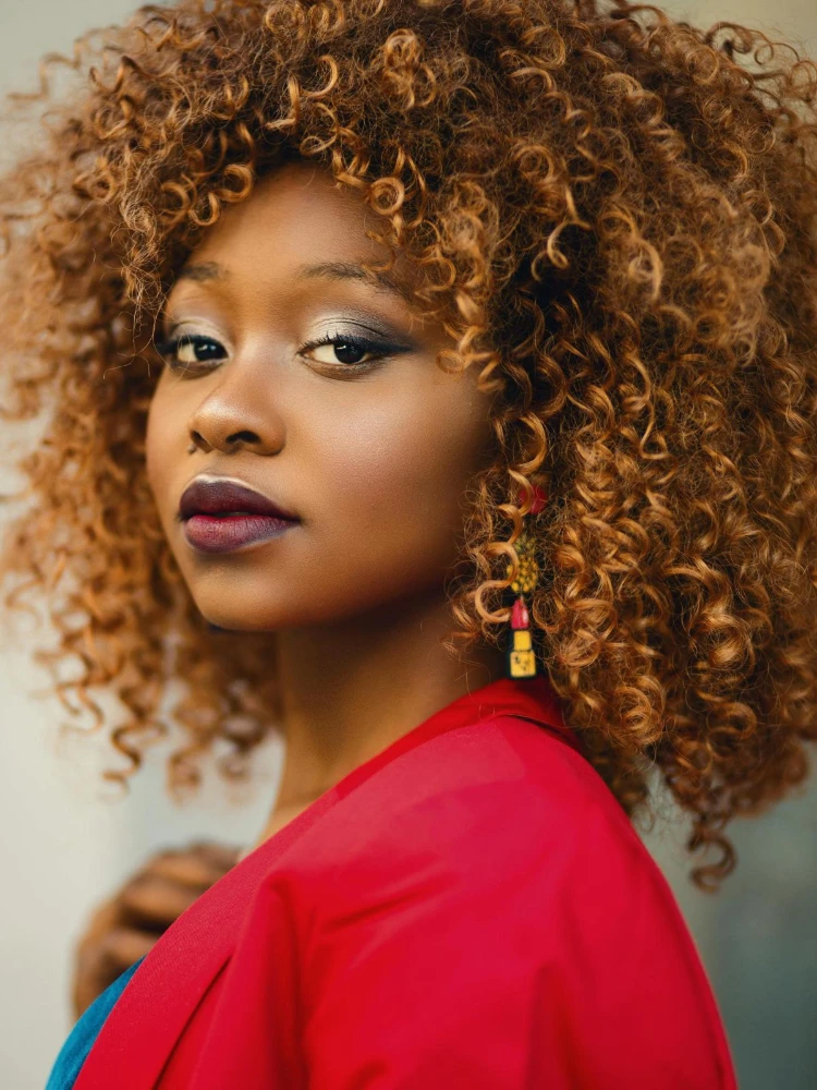 DH Solutions hair stylist website template - woman with type 4 hair after hot oil treatment