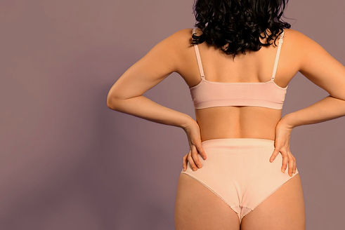Tan woman wearing underwear for Glow Luxe Spray Tan in Tulsa OK