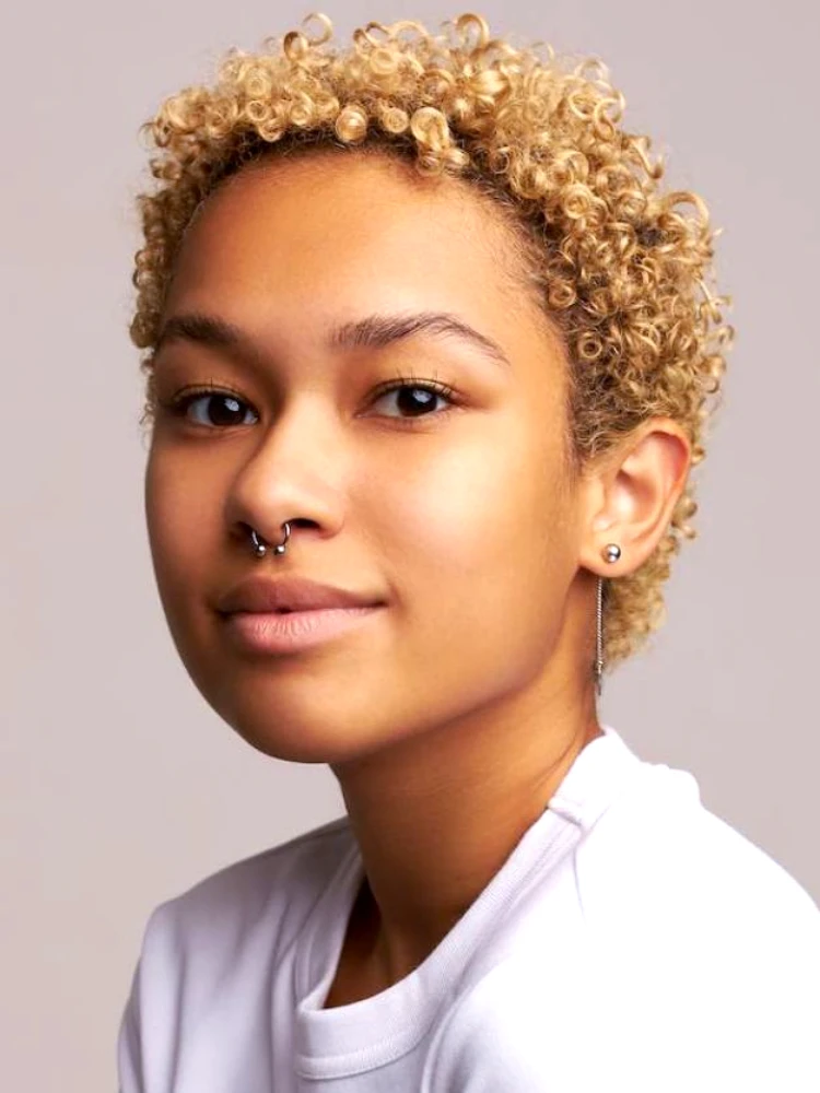 DH Solutions hair stylist website template - woman with type 4 hair after hot oil treatment