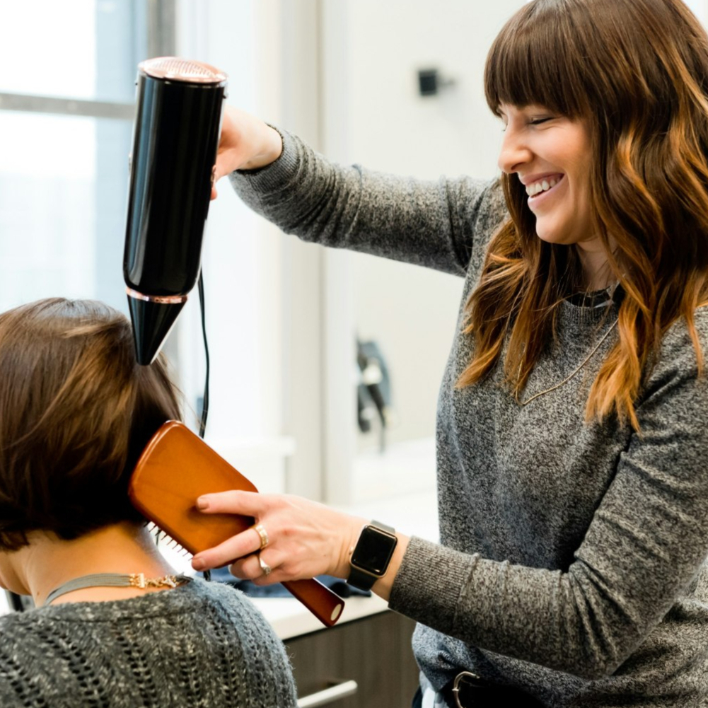 Hair stylist photo for DH Solutions' Wix Studio hair stylist template