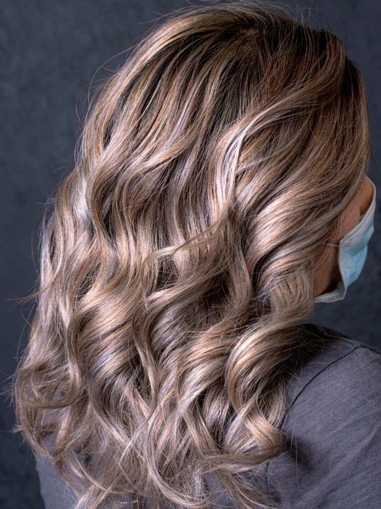 DH Solutions hair stylist website template - woman's hair after shampoo and blow dry whose hair was shampood and