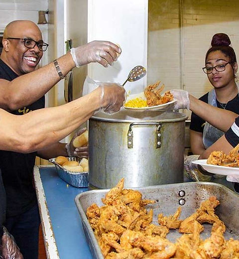 AGB-Community-Service-Serving-Meal-1-845x600.jpg