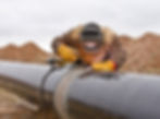 ROC Construction team welding pipelines with precision