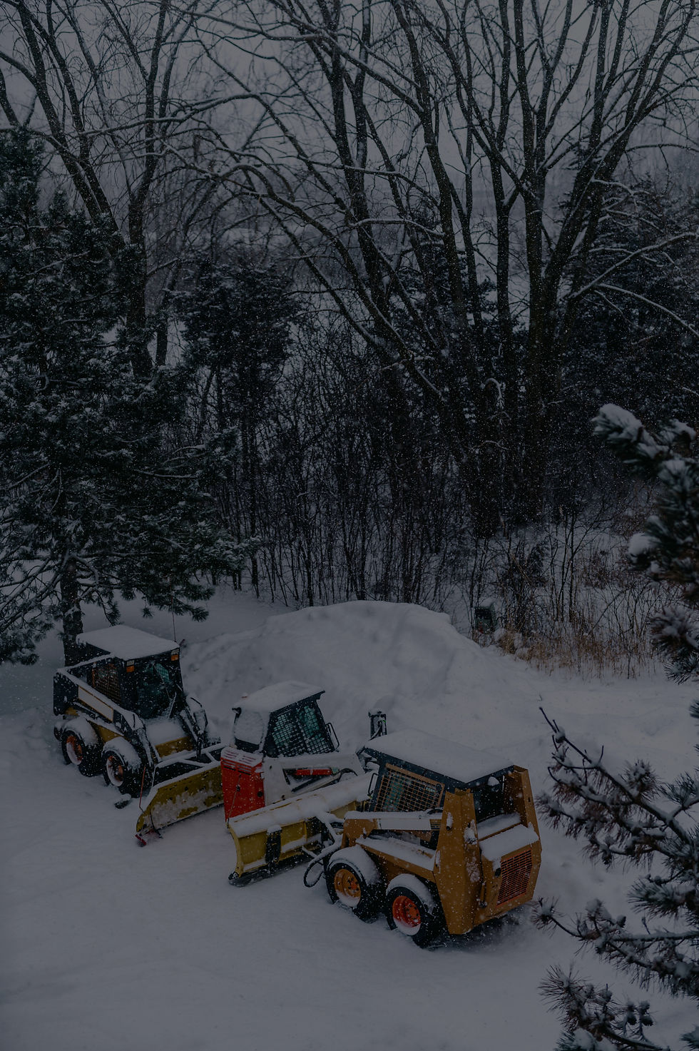 aerial-shot-of-snow-cleaning-equipment-in-the-back-2025-02-05-10-15-52-utc-min_edited.jpg