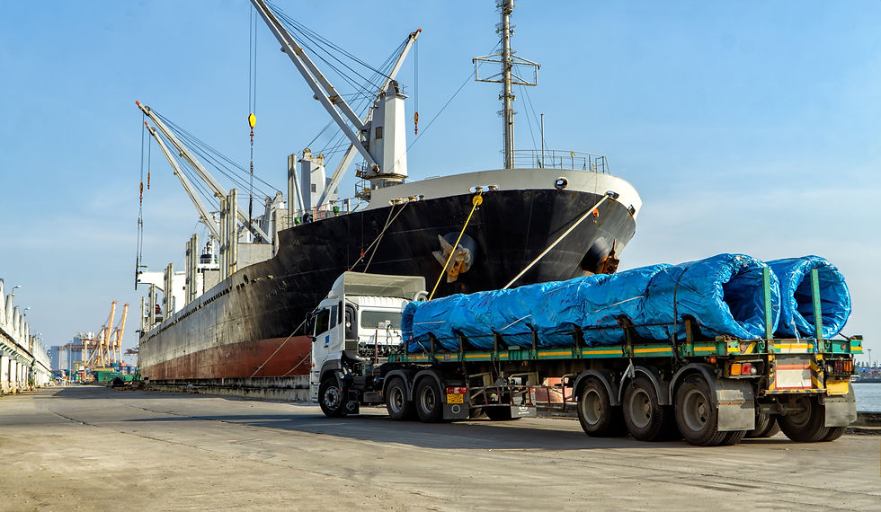 cargo-ship-and-truck-transporting-blue-coiled-mate-2026-03-18-05-05-43-utc.jpg