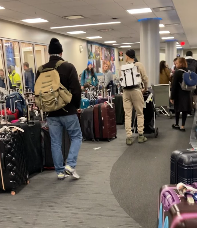 Luggage from canceled flights piles up at John Glenn Columbus International Airport. Photo by Meri Wheeler.