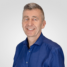 Smiling man in a blue shirt