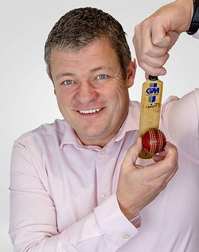 Jonathan Bouchier with miniature cricket bat and ball