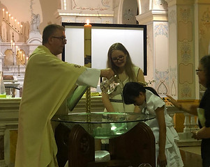 Isabelle being baptised.jpg