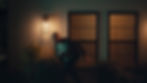 Thumbnail: nighttime image of suspicious person outside house trying to get inside