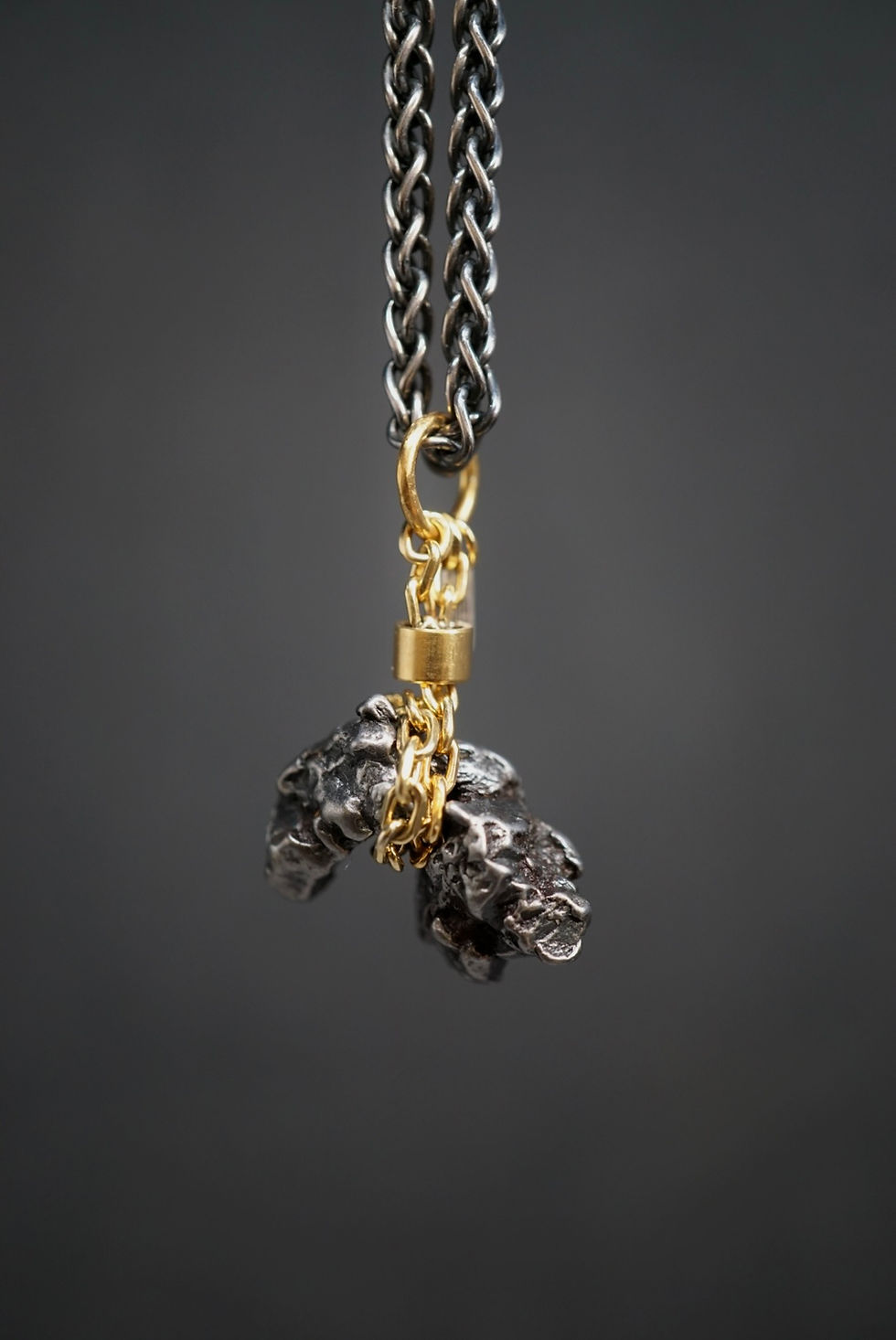 Thumbnail: "Taming the Raw” pendant