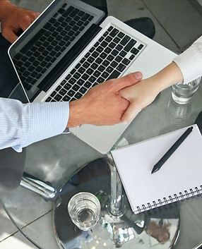 Advisor and client shaking hands