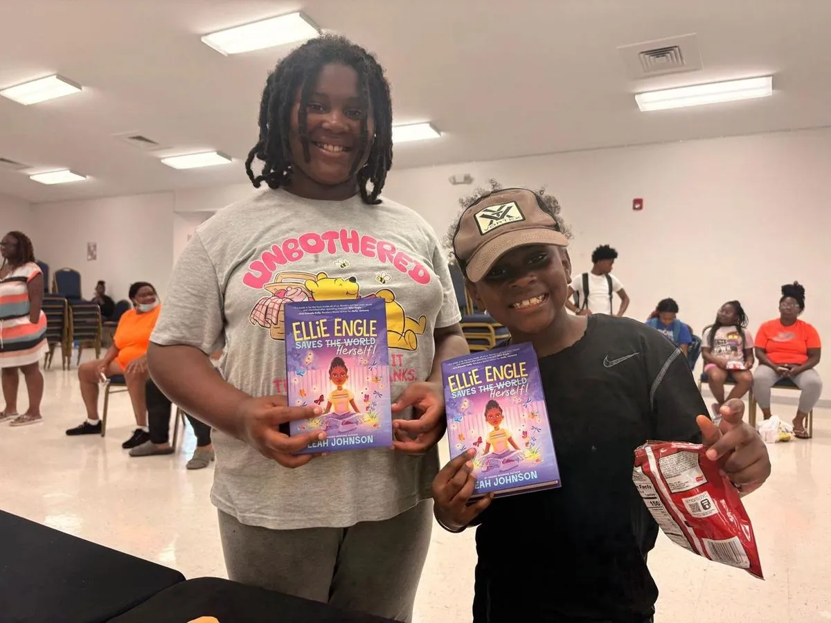 Children smiling with their new books