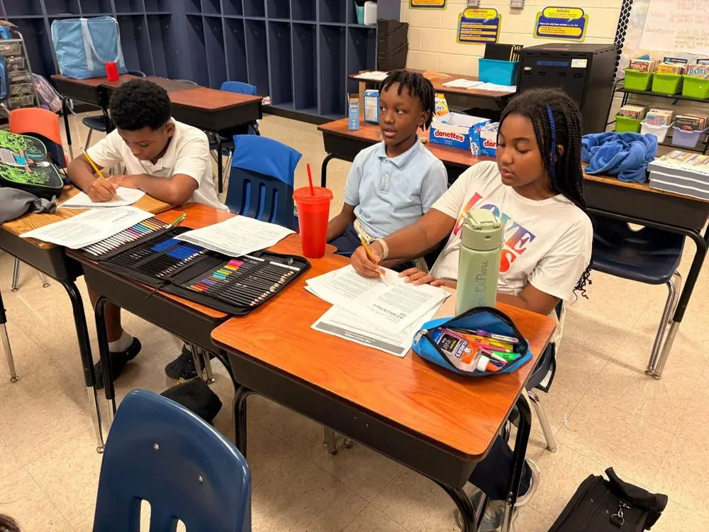 Grahamwood Elementary students writing at their desks