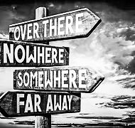 Roadsign reflecting travel to underdetermined places