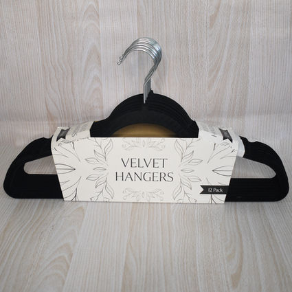 A photo of a set of hangers in their store packaging