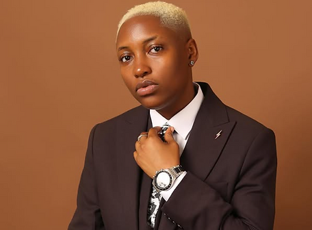 Manager Gee in Suit.png