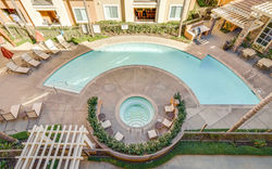 Aerial view of pool amenities at an Airbnb property in Irvine, Orange County, CA captured with profe