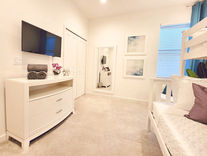 Twin over full bunkbed kid children's family luxurious modern 4 bedroom vacation home rental in Orlando near Disney World Universal SeaWorld with private pool and game room.